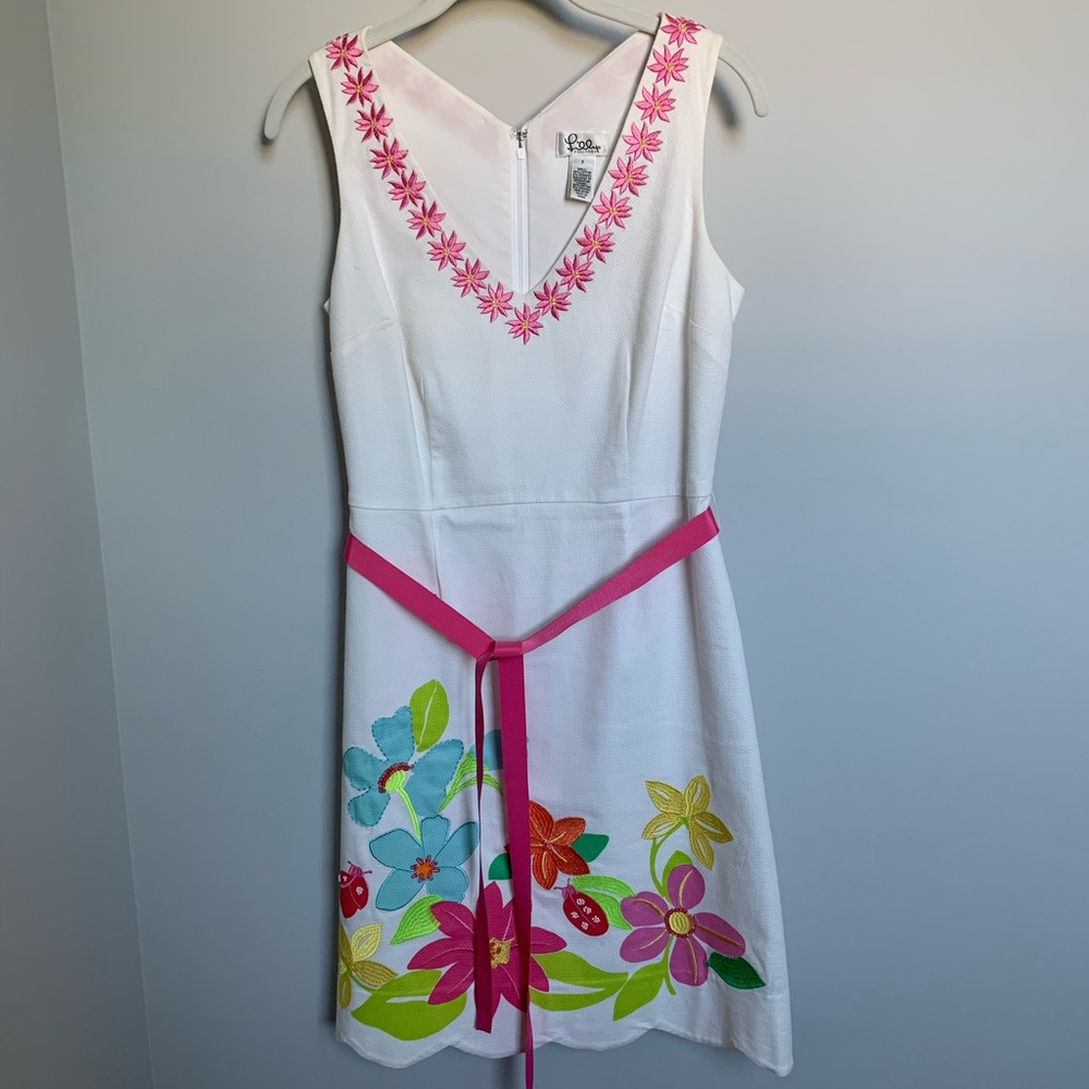 Lily Pulitzer scalloped white sleeveless dress with flower and bug appliqués.